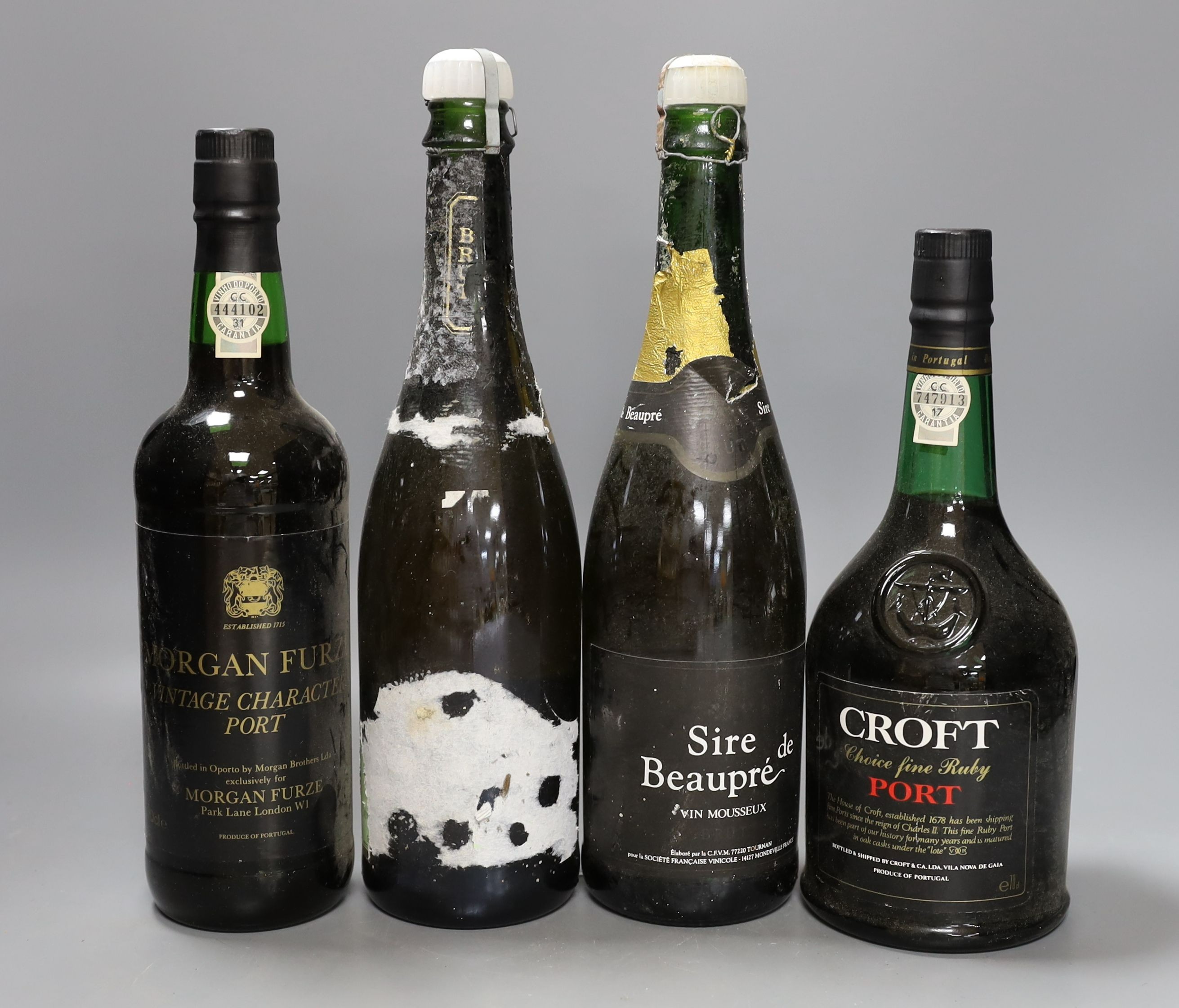 A group of wines and champagnes including Chateau La Coustere, Laurent-Perrier, L.Gardner and a bottle of Renault cognac